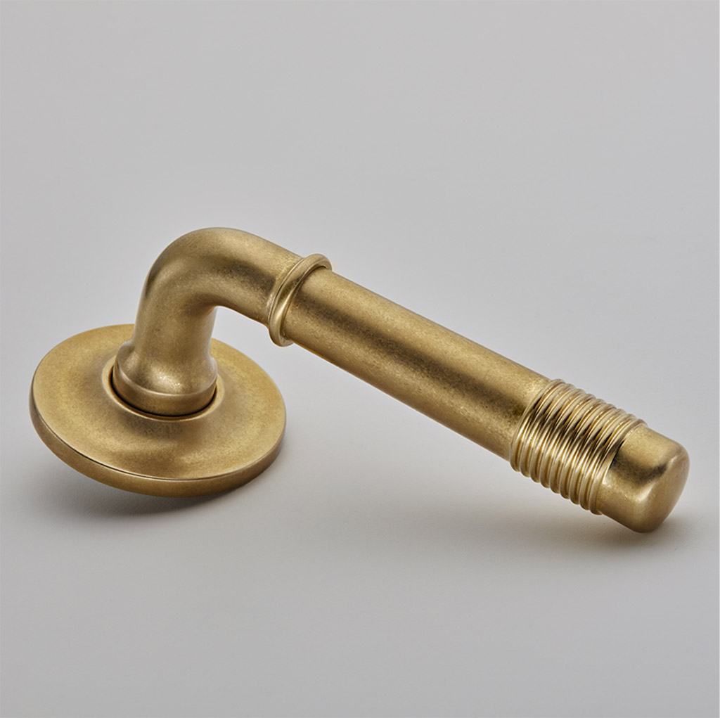 Crest Door Handle on Plain Covered Rose