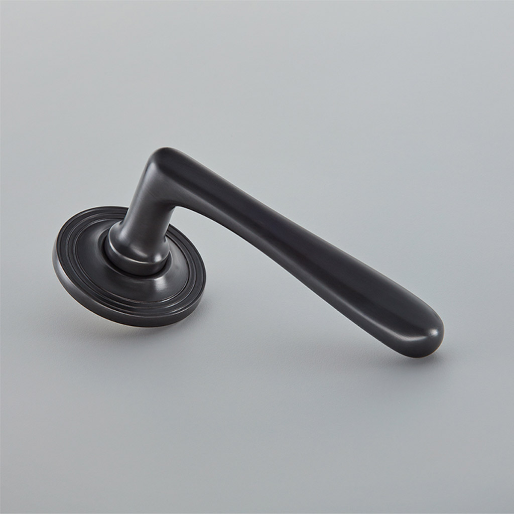 Elegance Door Handle on Reeded Covered Rose