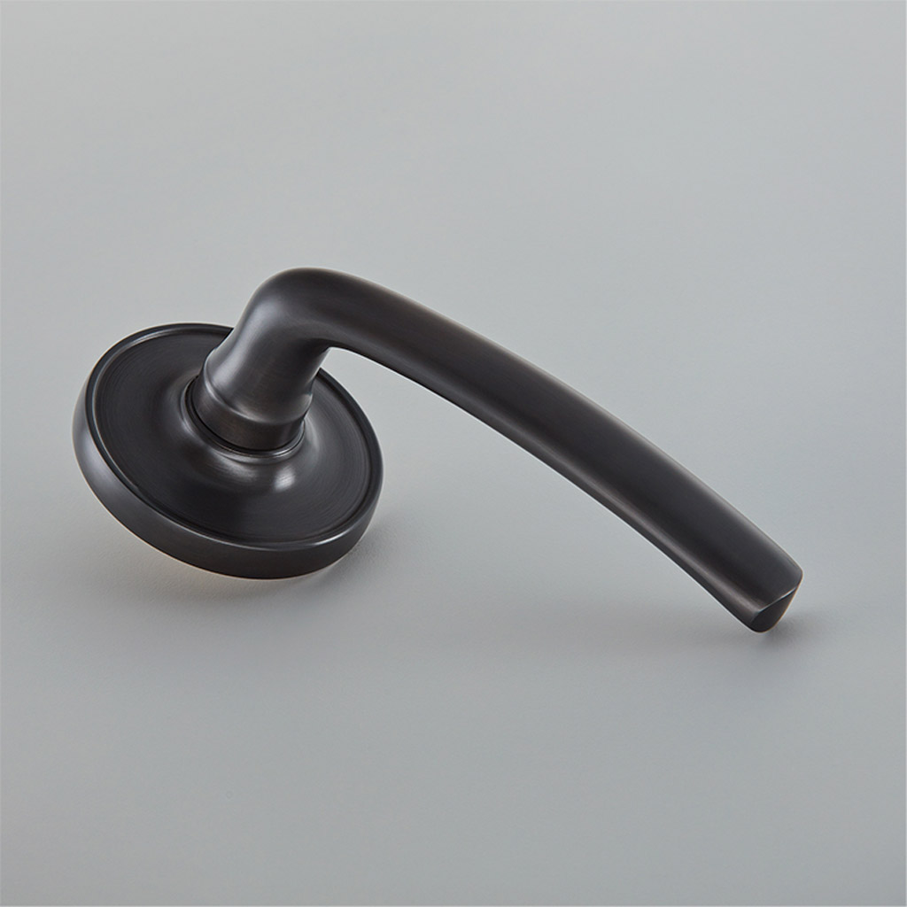 Floe Door Handle on 65mm Raised Edge Covered Rose