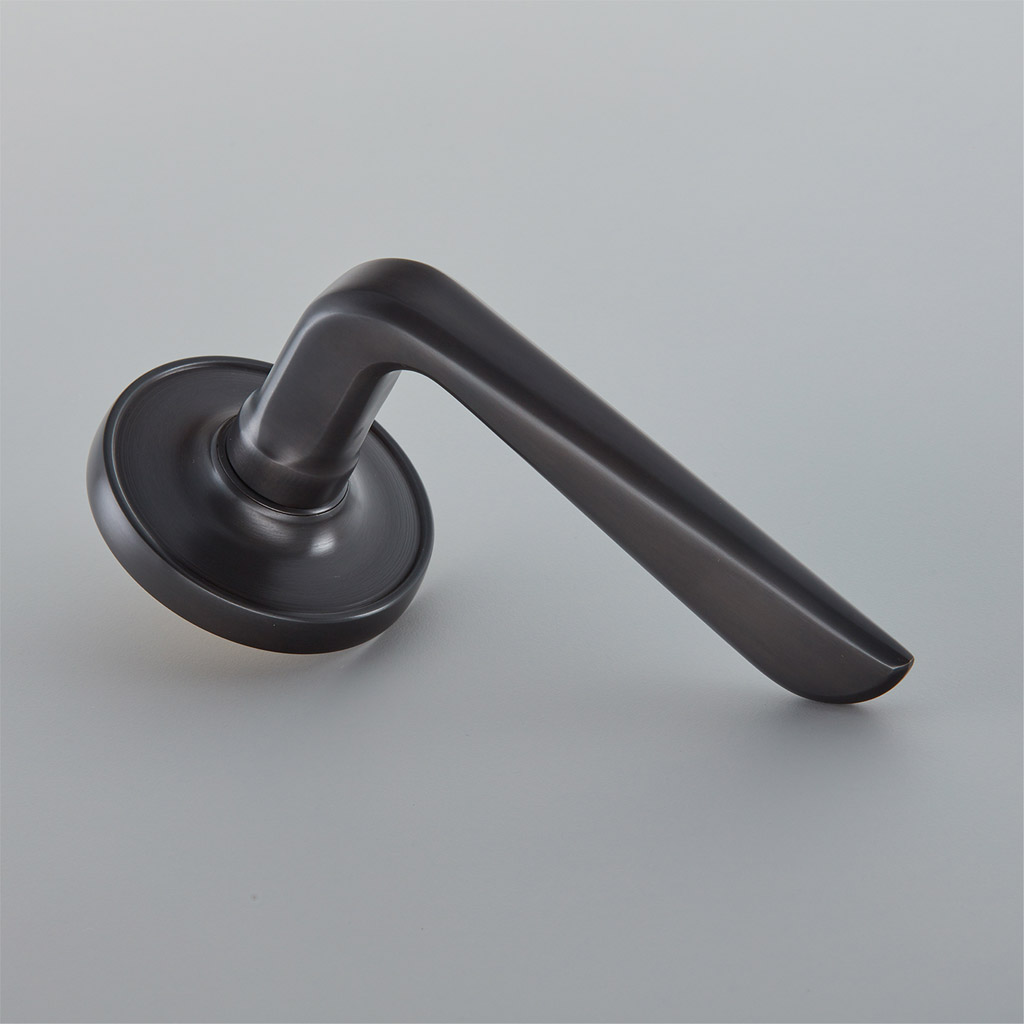 Celeste Door Handle on 65mm Raised Edge Covered Rose