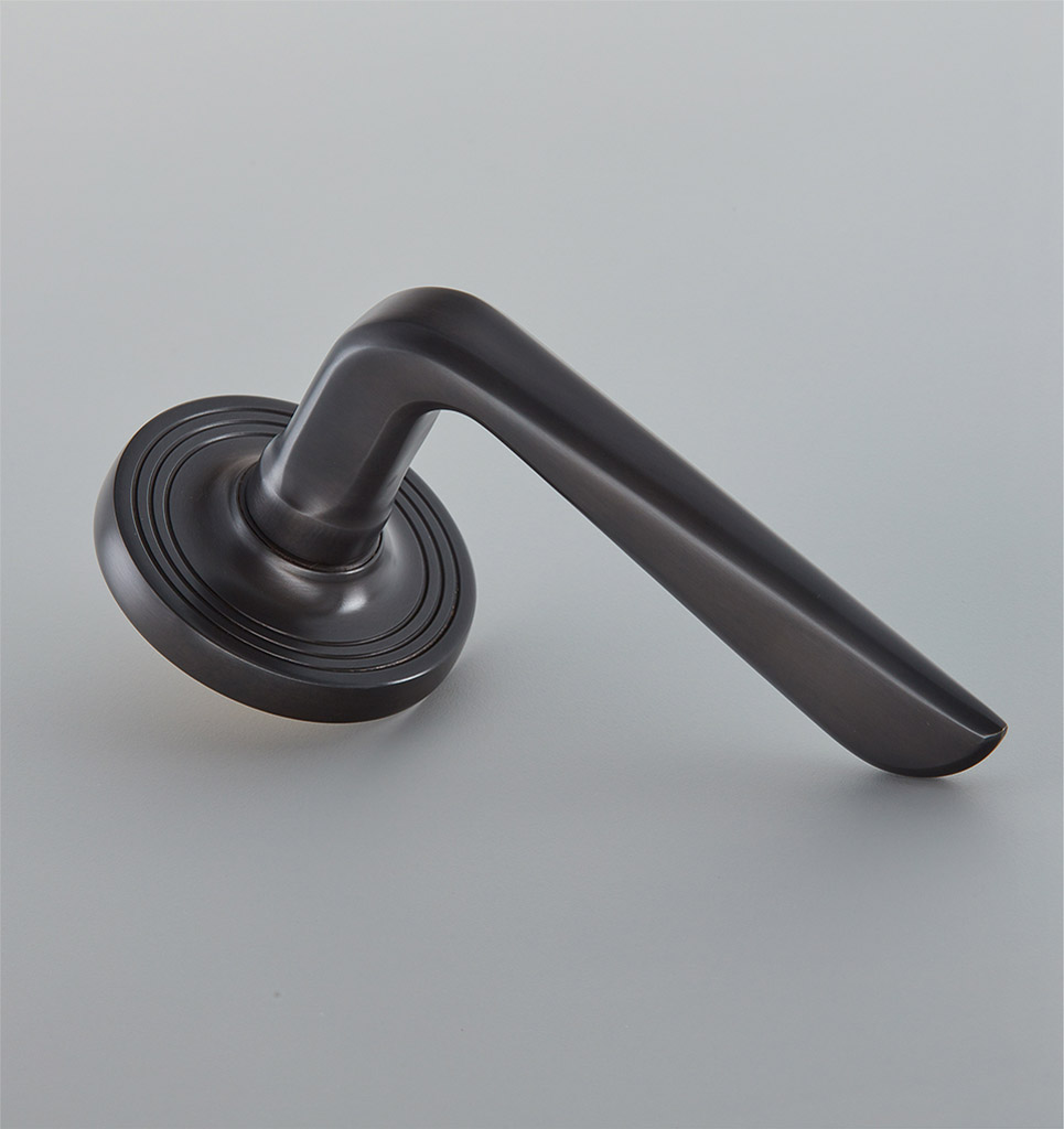 Celeste Door Handle on 65mm Reeded Rose